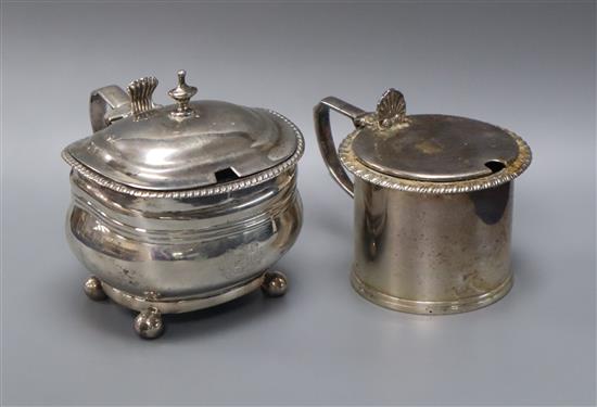 A George III silver drum mustard of oblong form, London 1812 and a George V silver circular drum mustard,